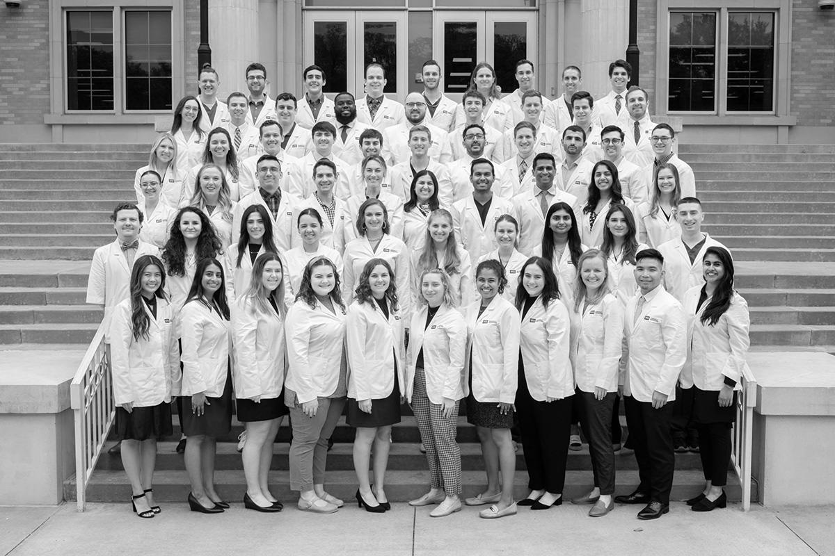 TCU School of Medicine Class of 2024 in white medical coats