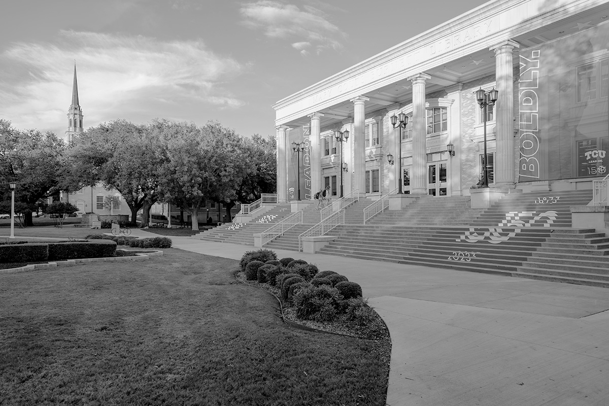 Mary Couts Burnett Library west entrance with Lead On banners hanging between columns